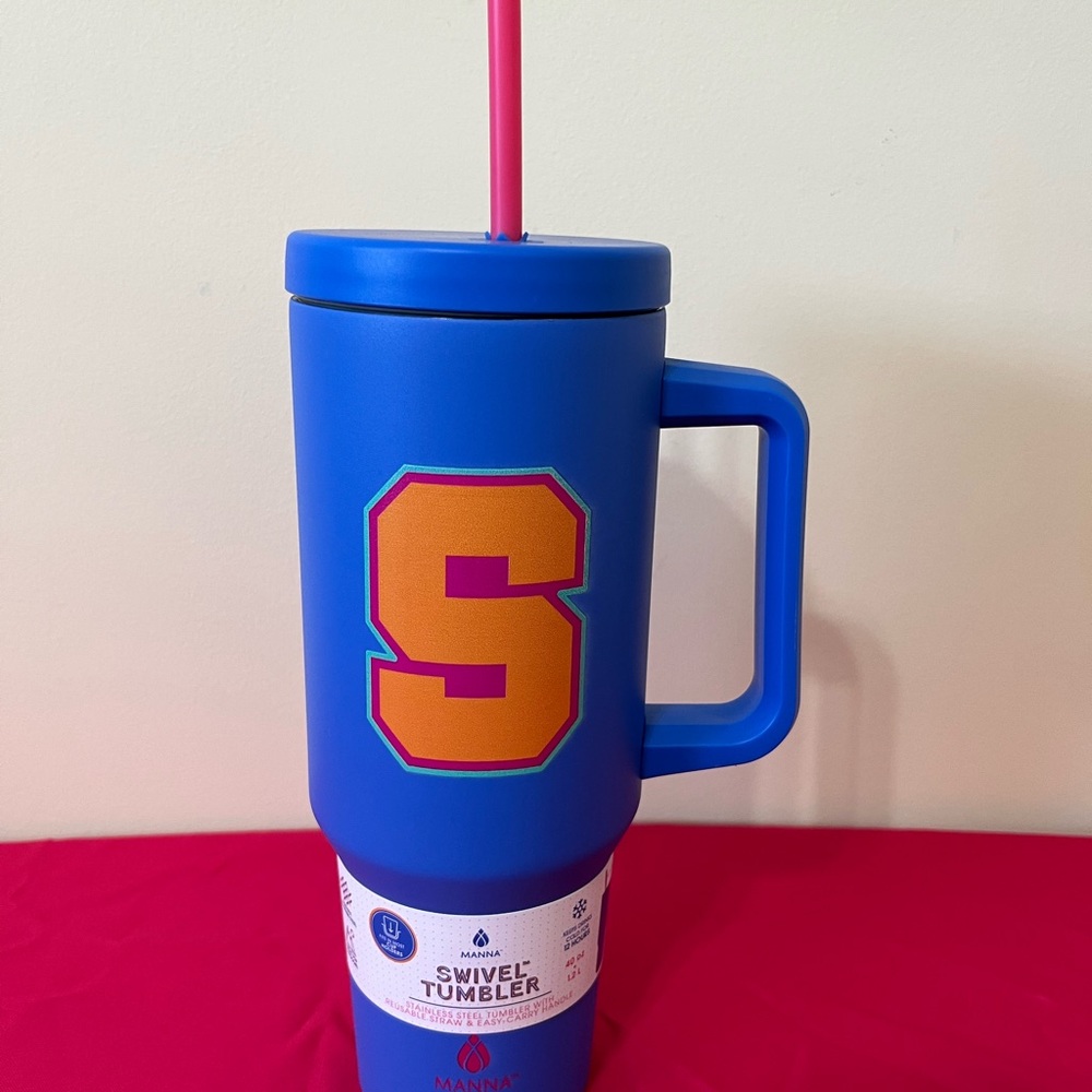 Manna Hydration Blue Tumbler with Orange Letter S and Pink Straw